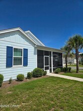 8320 Jollymon Wy in Panama City Beach, FL - Foto de edificio - Building Photo