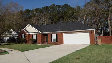 84 Ryan Dr in Richmond Hill, GA - Building Photo - Building Photo