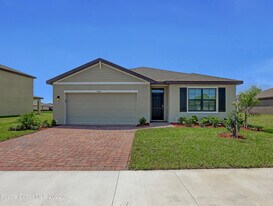 7418 Tourmaline Dr in Grant Valkaria, FL - Building Photo