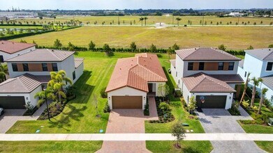 4907 Coquina Pl in Westlake, FL - Building Photo - Building Photo