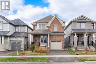 27 Harpin Wy W in Centre Wellington, ON - Building Photo