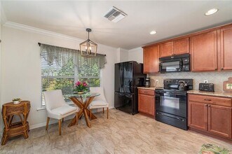 15142 Reef Ln in Bonita Springs, FL - Foto de edificio - Building Photo