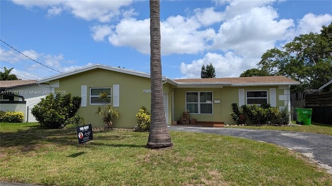 property at 6701 NW 25th Ct