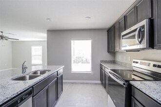 127 Tulip Ln in Poinciana, FL - Building Photo - Building Photo