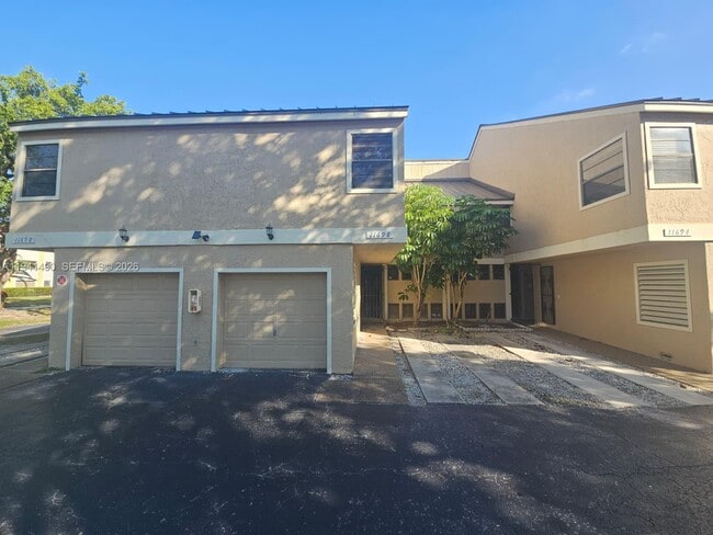 11696 NW 20th Dr in Coral Springs, FL - Building Photo - Building Photo