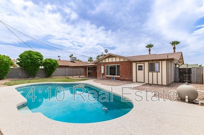 property at 8716 E Holly St