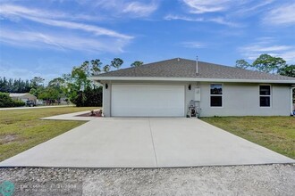 14845 60th Ct N in Loxahatchee, FL - Foto de edificio - Building Photo