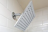 Modern Shower and Bath Fixtures - Central Park Apartments in Detroit, Michigan