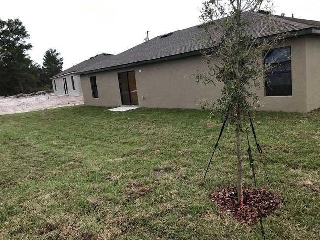 5 Redwood Ct in Poinciana, FL - Foto de edificio - Building Photo