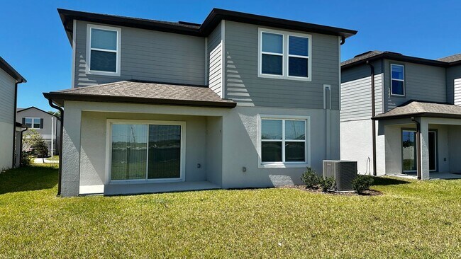 9058 Rally Spring Lp in Wesley Chapel, FL - Building Photo - Building Photo
