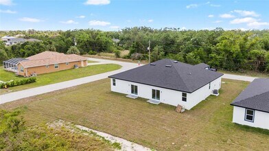 10026 Cocoa Beach St in Port Charlotte, FL - Building Photo - Building Photo