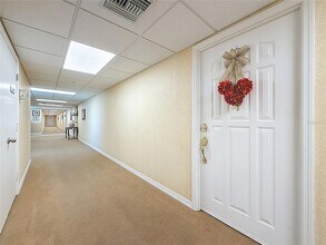 400 64th Ave, Unit 1204 in St Pete Beach, FL - Foto de edificio - Building Photo