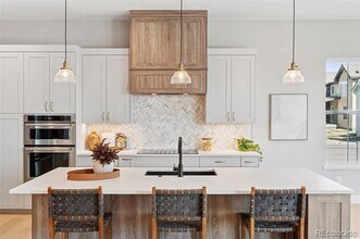 1403 Burt Ave in Berthoud, CO - Foto de edificio - Building Photo