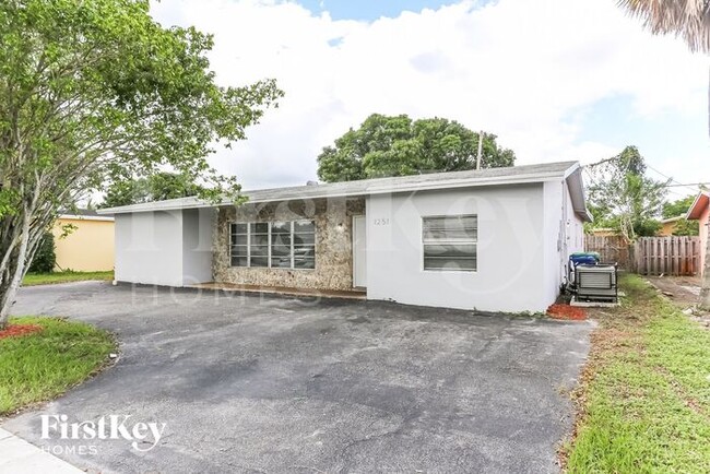 1251 NW 56th Ave in Lauderhill, FL - Building Photo - Building Photo