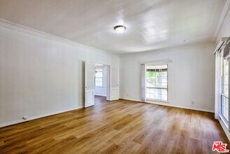 203 S Doheny Dr in Beverly Hills, CA - Building Photo - Building Photo