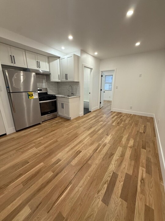 9717 101st St, Unit 9717 1st flr in Ozone Park, NY - Building Photo