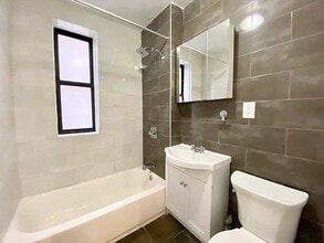 119 Post Ave in New York, NY - Building Photo - Building Photo