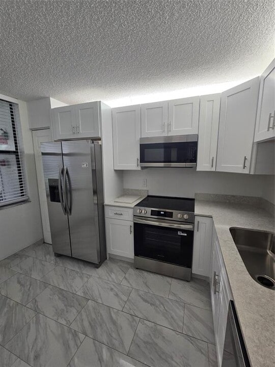 1228 S Military Trl, Unit 2114 in Deerfield Beach, FL - Building Photo