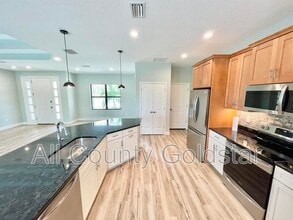 8374 Agate St in Port Charlotte, FL - Building Photo - Building Photo