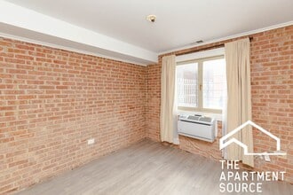 665 W Melrose St, Unit E in Chicago, IL - Building Photo - Building Photo