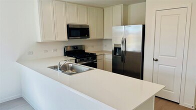 9206 Speckled Trout Dr in Baytown, TX - Building Photo - Building Photo