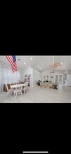 1018 Woodshire Ln, Unit A208 in Naples, FL - Building Photo - Building Photo