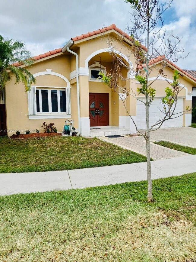 property at 8995 NW 148th St