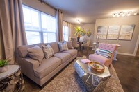 Living Room - Palisades at Pleasant Crossing Apartments in Rogers, Arkansas