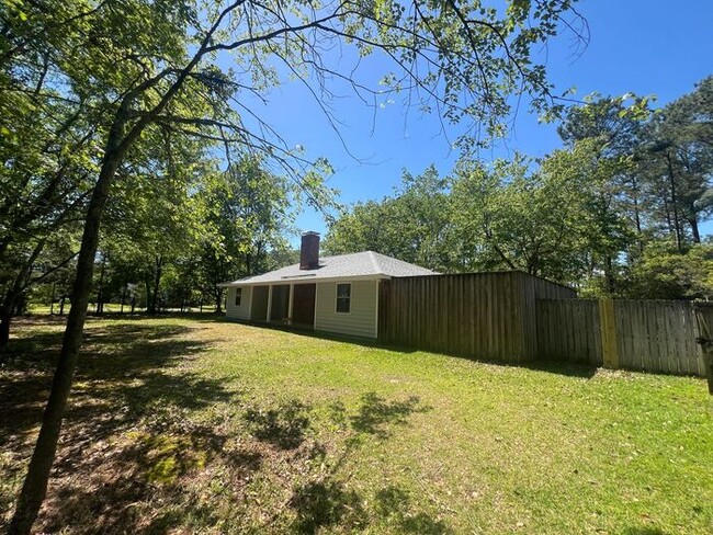 property at 207 Whispering Pines Ct