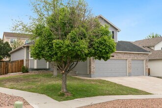 4-Bedroom Home with Main-Level Suite, Gran in Colorado Springs, CO - Building Photo - Building Photo