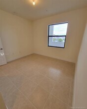 7915 NW 104th Ave-Unit -25 in Doral, FL - Building Photo - Building Photo