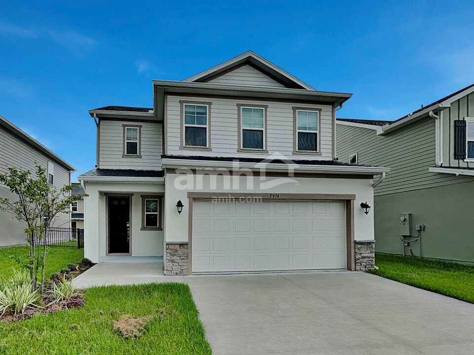 5974 Pinewood Ests Dr in St. Cloud, FL - Building Photo