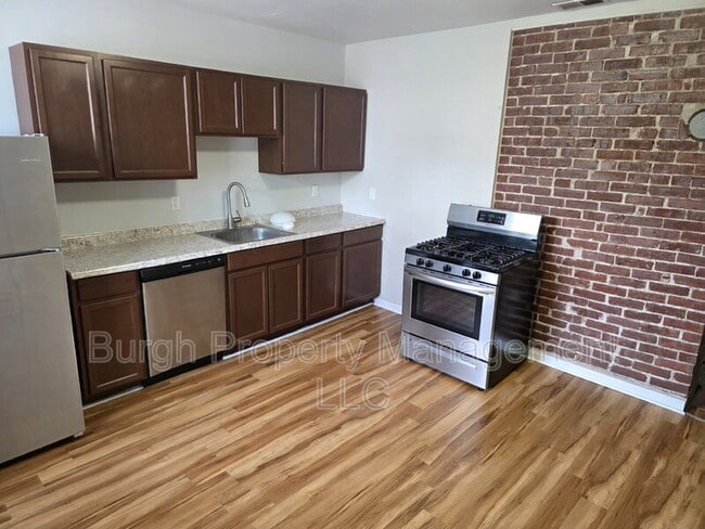 property at 114 W 8th Ave