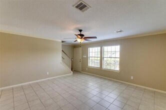 521 E House St, Unit A in Alvin, TX - Building Photo - Building Photo