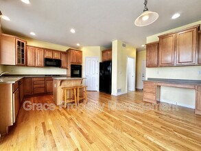 6180 S Newbern Way in Aurora, CO - Building Photo - Building Photo