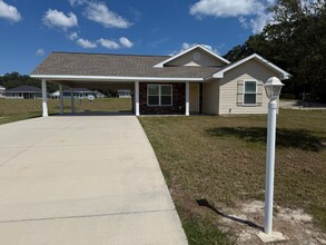 3288 NE Caitlin Ln in Bell, FL - Building Photo - Building Photo