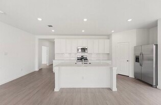 10351 Woodhill Spa Ln in Cleveland, TX - Building Photo