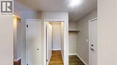 10114-10105 105 Ave in Grande Prairie, AB - Building Photo - Building Photo