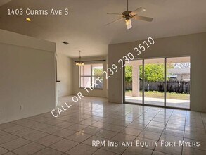 1403 Curtis Ave S in Lehigh Acres, FL - Building Photo - Building Photo