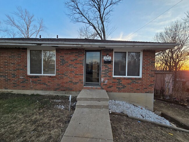 property at 8713 E 7 St