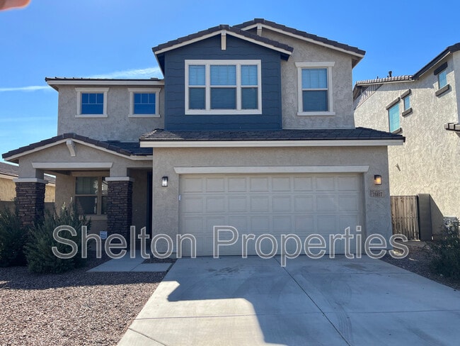 property at 10817 W San Juan Ave