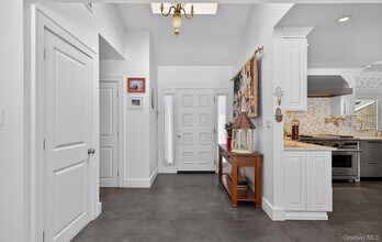 11 Juneau Blvd in Woodbury, NY - Building Photo - Building Photo