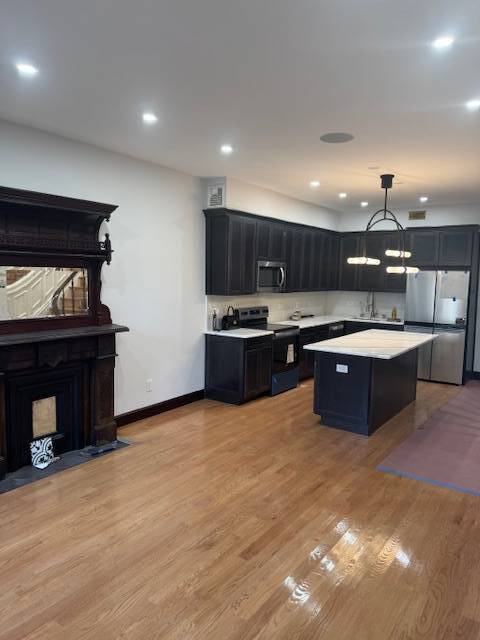 114 W 131st St in New York, NY - Building Photo