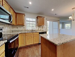 6844 Thistle Down Dr in Harrisburg, NC - Building Photo - Building Photo