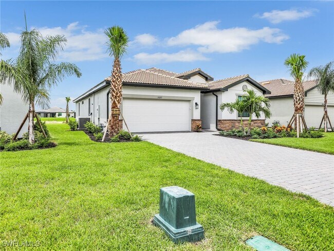19097 Hinkley Dr in Estero, FL - Building Photo - Building Photo