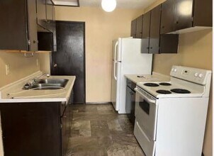 4813-4854 54 St in Olds, AB - Building Photo - Building Photo