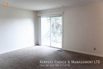 2 Bedroom, Assigned Parking, Onsite Laundry in Lethbridge, AB - Building Photo - Building Photo
