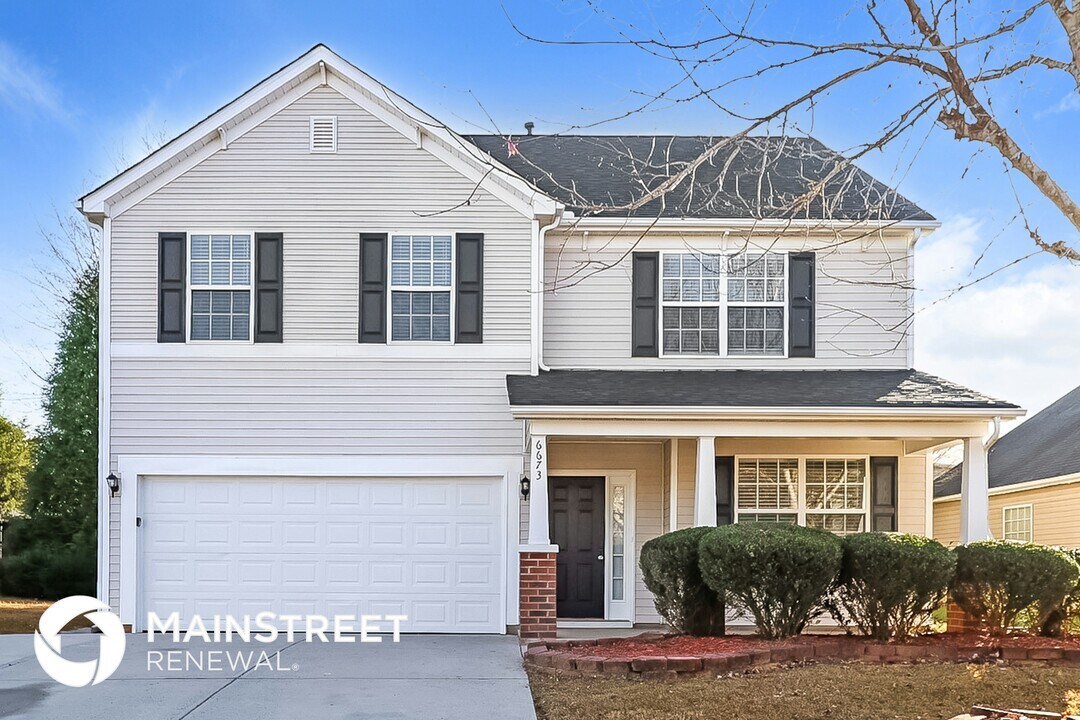 6673 Thistle Down Dr in Harrisburg, NC - Building Photo