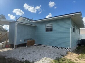 3823 N Garrison St in Tampa, FL - Building Photo - Building Photo