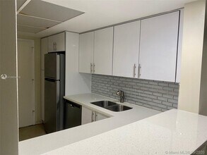 1591 NE Miami Gardens Dr-Unit -114 in Miami, FL - Building Photo - Building Photo